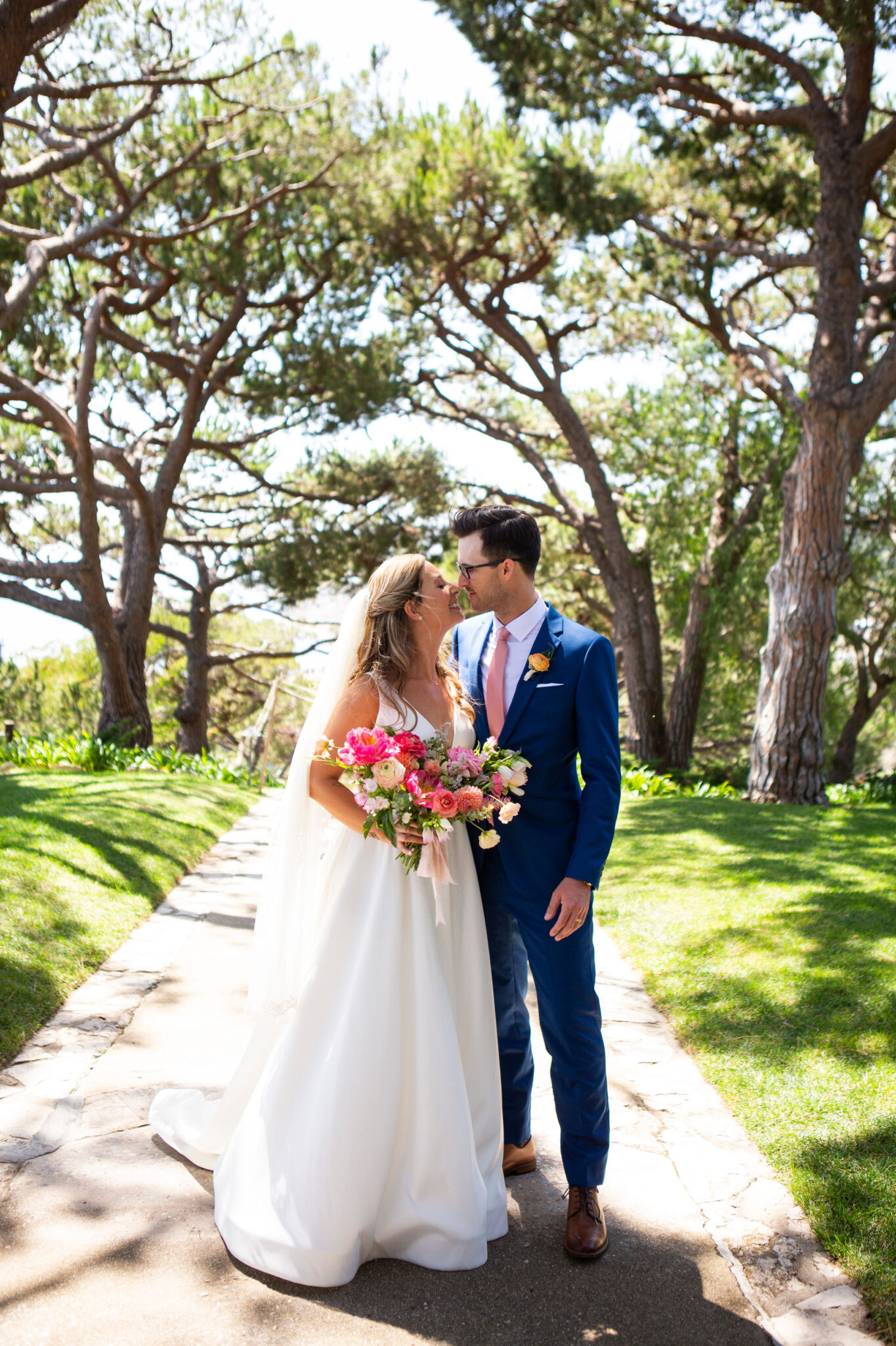 meagan and kyle's colorful california wedding wayfarers chapel